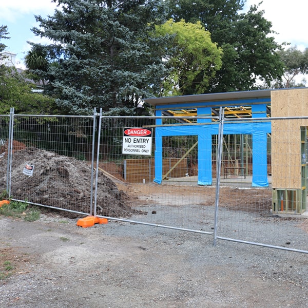 do you deliver and set up temporary fencing and what's the cost for these services in Goshen